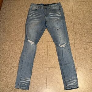 /serenedē/ Sedona 2.0 Stretch Skinny Jean in
Destroyed Ice Crush Blue size 32